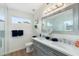 Modern bathroom features a double vanity, and stylish lighting creating a serene and functional space at 14241 N 56Th Pl, Scottsdale, AZ 85254