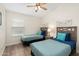 Comfortable bedroom with two twin beds, neutral decor, and natural light at 14241 N 56Th Pl, Scottsdale, AZ 85254