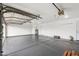 Spacious garage with ample storage space, ready for vehicles and projects at 14241 N 56Th Pl, Scottsdale, AZ 85254