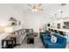 Bright, open-concept living room and kitchen with ample seating and a large island at 14241 N 56Th Pl, Scottsdale, AZ 85254
