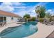 Backyard pool and spa, with a blue, clear water and a cleaner on the bottom at 14241 N 56Th Pl, Scottsdale, AZ 85254