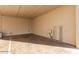 Enclosed carport featuring concrete floors and brick walls at 14261 N Oakwood Ln, Fountain Hills, AZ 85268