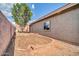 Backyard with gravel, perfect for low-maintenance living at 15856 W Calavar Rd, Surprise, AZ 85379