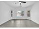Bedroom with a view to the backyard swimming pool at 15856 W Calavar Rd, Surprise, AZ 85379