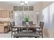 Dining area showcases a classic wooden table and ample seating for Gathering gatherings at 17128 E Kensington Pl, Fountain Hills, AZ 85268
