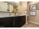 Elegant bathroom with a double sink vanity, quartz countertops, and modern fixtures at 17656 W Bajada Rd, Surprise, AZ 85387