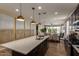 Modern kitchen with stainless steel appliances, a large center island, and an open floor plan at 17656 W Bajada Rd, Surprise, AZ 85387