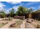 Backyard with landscaping and a rock feature at 1985 S Plaza Dr, Apache Junction, AZ 85120
