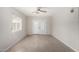 An open-concept living room with light wood floors and neutral paint provides a bright and airy space at 1985 S Plaza Dr, Apache Junction, AZ 85120