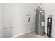 A small utility room featuring the home's water heater at 1985 S Plaza Dr, Apache Junction, AZ 85120
