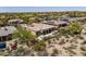 Aerial view of backyard pool and patio area featuring a jacuzzi and outdoor seating at 21397 N 78Th St, Scottsdale, AZ 85255