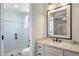 Bathroom with a walk-in shower and vanity with white cabinets at 21397 N 78Th St, Scottsdale, AZ 85255