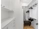 Organized walk-in closet with custom shelving, drawers, and ample storage space at 21397 N 78Th St, Scottsdale, AZ 85255