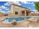 Spacious backyard with private pool and ample patio space, perfect for entertaining guests and enjoying the outdoors at 2143 N Chestnut Cir, Mesa, AZ 85213