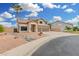 Two-story home with a three-car garage, desert landscaping, and block wall at 2143 N Chestnut Cir, Mesa, AZ 85213