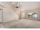 Spacious living room featuring vaulted ceilings and carpet at 2143 N Chestnut Cir, Mesa, AZ 85213