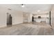 Inviting living room adjacent to a modern kitchen with an island at 2143 N Chestnut Cir, Mesa, AZ 85213