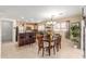 Inviting kitchen and dining area boasting warm cabinetry and an open layout at 2167 S Luther Ave, Mesa, AZ 85209
