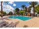 Community pool with plenty of space to lounge around and enjoy palm trees at 2167 S Luther Ave, Mesa, AZ 85209
