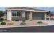 Charming single-story home with neutral color palette, low maintenance landscaping, and attached two car garage at 2356 E Spur Dr, San Tan Valley, AZ 85140