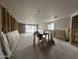 Unfinished basement with concrete flooring, installed framing, and sliding glass doors at 2370 E Spur Dr, San Tan Valley, AZ 85140