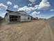 New home under construction featuring a large backyard and block wall at 2370 E Spur Dr, San Tan Valley, AZ 85140