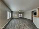 Bright living space features wood-look floors, backyard access and plenty of natural light at 2600 E La Costa Dr, Chandler, AZ 85249