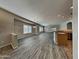 Spacious living room features ample natural light and wood-look floors at 2600 E La Costa Dr, Chandler, AZ 85249