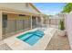Private backyard pool offering a refreshing retreat with safety fence at 2600 E La Costa Dr, Chandler, AZ 85249