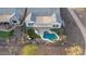 Private backyard oasis with a freeform pool, lounge area, and desert landscaping at 26673 W Ponderosa Ln, Buckeye, AZ 85396