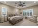 Serene bedroom featuring a comfortable bed, soft lighting, and a relaxing atmosphere at 26673 W Ponderosa Ln, Buckeye, AZ 85396
