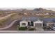 Attractive desert home with gray tile roof, low maintenance yard, and mountain views at 26673 W Ponderosa Ln, Buckeye, AZ 85396