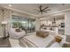 Bright and airy living room with sliding glass doors to patio and desert view at 26673 W Ponderosa Ln, Buckeye, AZ 85396
