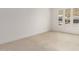 Bright bedroom with neutral tile flooring and natural light at 33857 N Borgata Trl, San Tan Valley, AZ 85144
