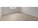 Bright bedroom with neutral tile flooring and natural light at 33857 N Borgata Trl, San Tan Valley, AZ 85144