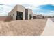 Contemporary home featuring unique architectural details, clean lines and desert landscaping at 33857 N Borgata Trl, San Tan Valley, AZ 85144