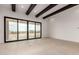 Open living space with large sliding glass doors that open to the outside at 33857 N Borgata Trl, San Tan Valley, AZ 85144