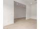 Open-concept living room with neutral tile flooring at 33857 N Borgata Trl, San Tan Valley, AZ 85144