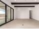 Bright living room featuring sliding glass doors and recessed lighting at 33857 N Borgata Trl, San Tan Valley, AZ 85144