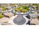 Neighborhood cul-de-sac with beautiful landscaping, a walking path, and common areas at 343 N 169Th Ave, Goodyear, AZ 85338