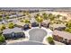 Aerial shot of homes situated in a cul-de-sac with well-maintained landscaping and convenient circular driveway at 343 N 169Th Ave, Goodyear, AZ 85338
