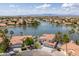 Picturesque waterfront community featuring gorgeous homes, a serene lake, and stunning mountain views at 3520 N 110Th Ave, Avondale, AZ 85392