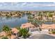 Lakeside homes with terracotta roofs are beautifully positioned within a tranquil community at 3520 N 110Th Ave, Avondale, AZ 85392