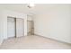 Bright bedroom features a closet and an open doorway at 3520 N 110Th Ave, Avondale, AZ 85392