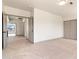Large bedroom showcasing neutral carpet, abundant closet space, and adjacent rooms at 3520 N 110Th Ave, Avondale, AZ 85392