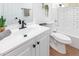 The bathroom features a vanity with a white sink, a toilet, and tiled walls at 3733 W Flynn Ln, Phoenix, AZ 85019