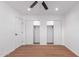 Bright bedroom with double closets, ceiling fan and hard wood floors at 3733 W Flynn Ln, Phoenix, AZ 85019