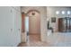 Inviting front entrance with tile flooring, high ceilings, an art-deco inspired entrance, and rustic design elements at 38065 N Cave Creek Rd # 9, Cave Creek, AZ 85331