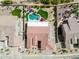 Expansive aerial view of a home with a large pool, well-manicured lawn, and desert landscaping at 4607 E Sierra Sunset Trl, Cave Creek, AZ 85331