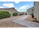 Low-maintenance backyard with desert landscaping, a stone pathway, and plenty of space for outdoor activities at 4607 E Sierra Sunset Trl, Cave Creek, AZ 85331